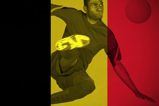 Football player in red kicking