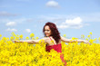 © taramara78 - Woman enjoying in a rape field