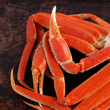 Crab Legs On Brown Background