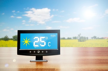 Wall Mural - Weather station device with weather conditions outside backgroun