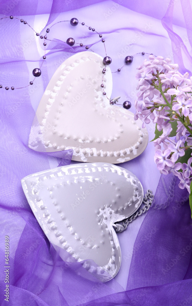 Obraz na płótnie Valentine metal heart with flowers of lilac w salonie