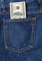 Wall Mural - hundred-dollar bills in jeans pocket