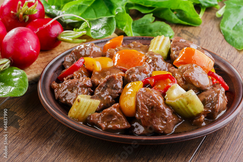 Fotografie, Obraz goulash meat with vegetables on the plate