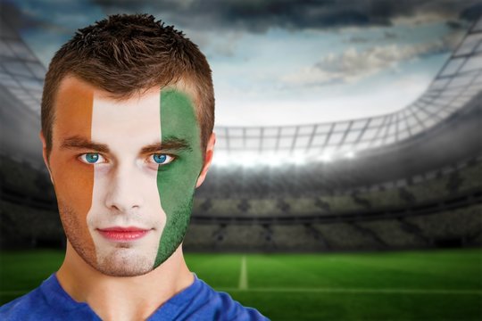 Ivory coast football fan in face paint