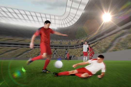 Football player in red kicking