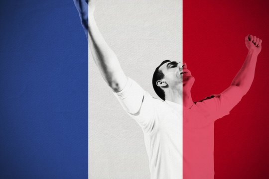 Excited football fan cheering