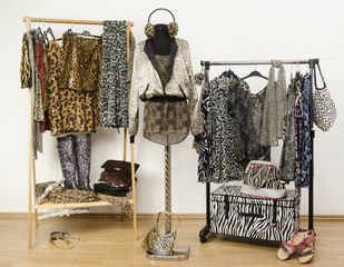 Wall Mural - Closet with animal print fall clothes and accessories on dummy.