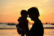 © nadezhda1906 - father and little daughter on sunset beach