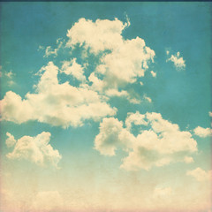 blue sky with clouds in grunge style.