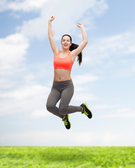 Sticker - sporty teenage girl jumping in sportswear