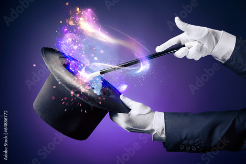 Fotomural High contrast image of magician hand with magic wand