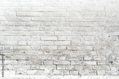 Fototapeta na wymiar White brick wall for background or texture
