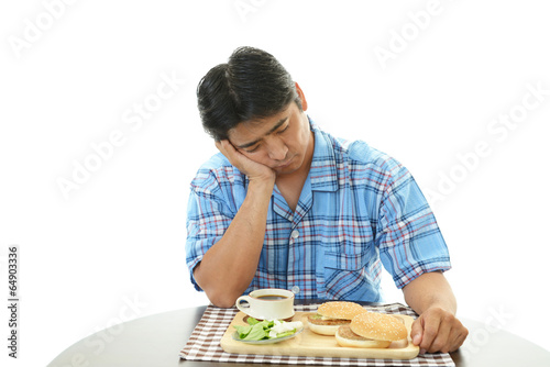 食欲不振の男性 Stock Photo Adobe Stock