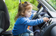 © marchibas - cute little girl behind wheel