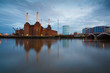 Battersea power plant reflecting on river Thames, London.