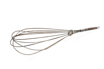 Vintage wire whisk isolated on white