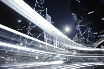 Wall Mural - Road light trails on streetscape buildings in HongKong