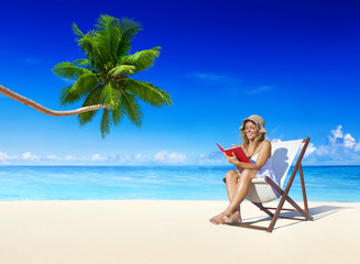 Wall Mural - Woman Relaxing on the Beach