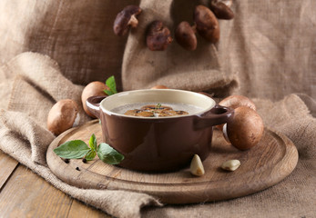 Canvas Print - Composition with mushroom soup in pot, fresh and dried