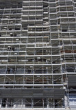 Fototapeta Kwiaty - Scaffolding on a construction site of a new building