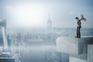 Poster - Composite image of wound up businessman with hands on hips
