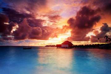 Wall Mural - Sunset over Maldives islands