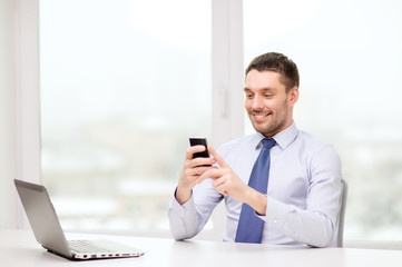 Sticker - businessman with laptop and smartphone at office