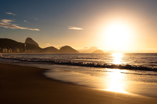 sunrise in copacabana beach in rio de janeiro, brazil