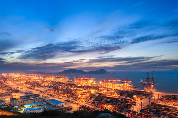 Canvas Print - modern seaport with evening sunset