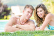 © william87 - Beautiful Young Couple Next to Swimming Pool