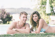 © william87 - Beautiful Young Couple Next to Swimming Pool
