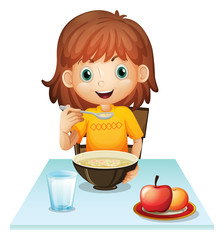 Wall Mural - A little girl eating her breakfast