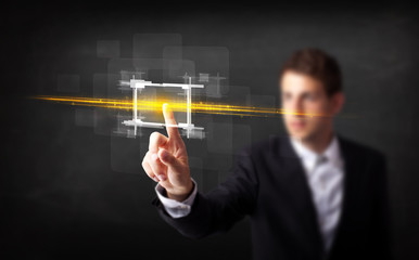 Aufkleber - Tech business person touching button with orange light beams con