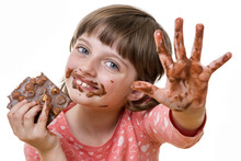 Little Girl Eating Chocolate