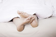 © wernerimages - feet in bed