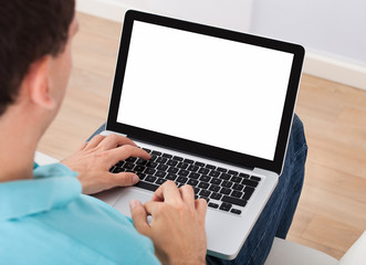 Poster - Man Using Laptop At Home