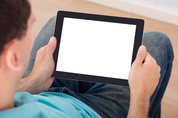 Poster - Man Looking At Blank Screen Of Digital Tablet