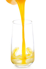 Canvas Print - Juice pouring into glass isolated on white