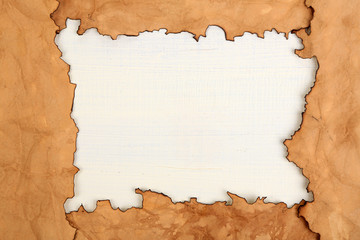 Sticker - Frame of old paper on wooden background