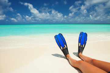 Wall Mural - Snorkeler relaxing on the beach