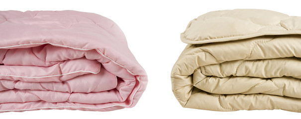 Parts of pink and beige blankets isolated on white background