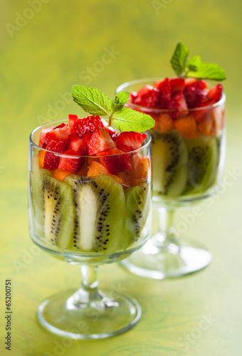 Naklejka - mata magnetyczna na lodówkę Fruit dessert with strawberry,kiwi and apricot