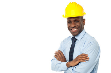 Construction manager with arms folded