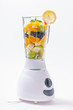 Mixed exotic fruits with leaf of mint in the blender