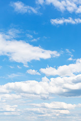 Wall Mural - many white puffy clouds in blue sky