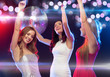 © Syda Productions - three smiling women dancing in the club