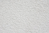 Fototapeta  - White rough plaster on wall