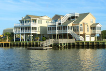 Color DSLR Image Of Luxury Vacation Beach Homes Across The Intercoastal Waterway; Horizontal With Copy Space For Text