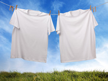 Blank White T-shirt Hanging On Clothesline