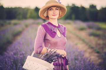 Sticker - Woman in purple dress and hat with basket in lavender field